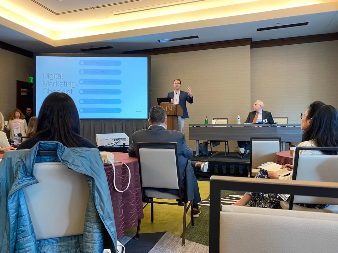 Physician reviewing marketing performance metrics for private practice